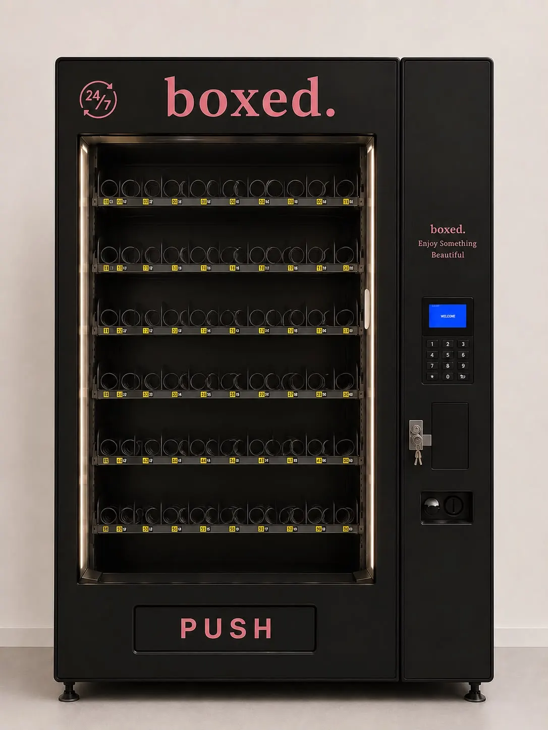 boxed. Getränke- und Snackautomat in Schwarz, sechs Ebenen mit leeren Spiralfächern, rechts daneben Display, Tastenfeld und Münzeinwurf.